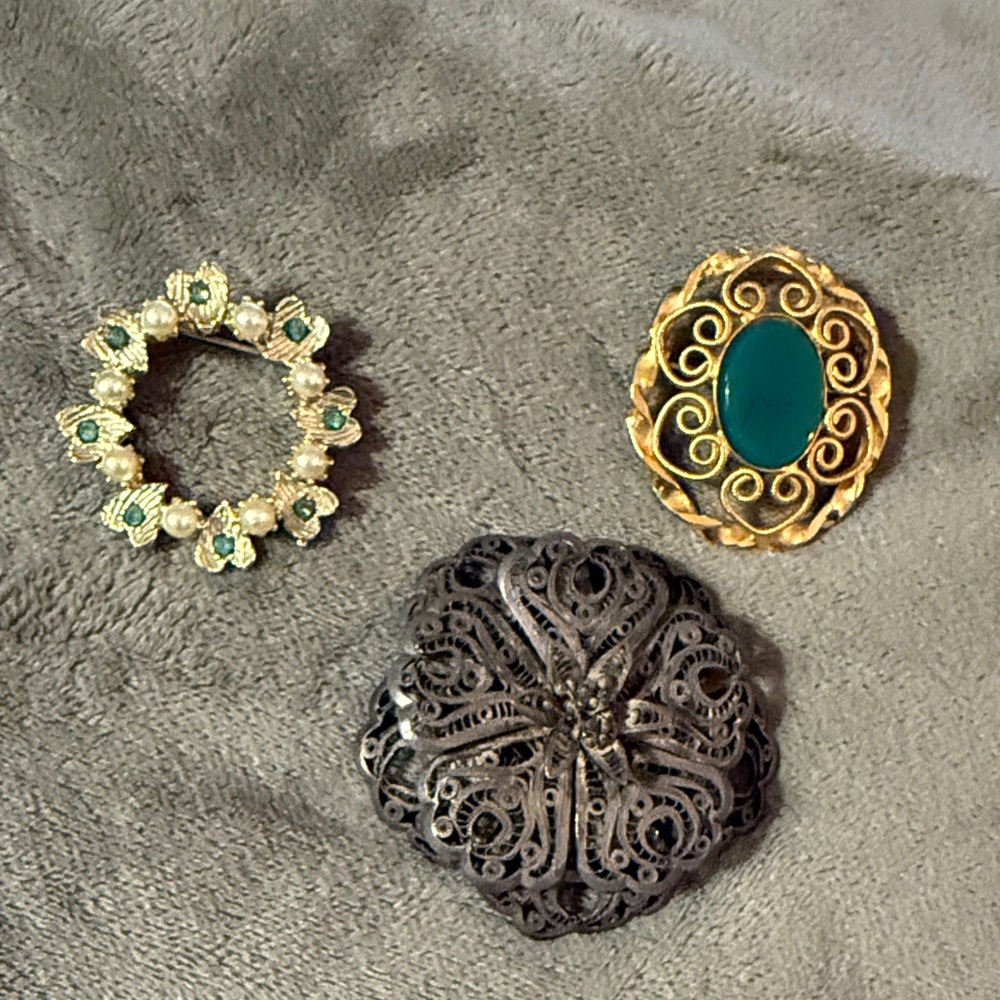 Elegant Gold and Silver Brooch Set with Green Accents